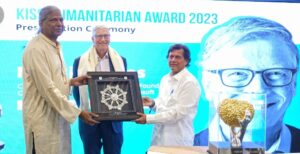 Bill Gates receives Kalinga Institute of Social Sciences Humanitarian Award from Achyuta Samanta